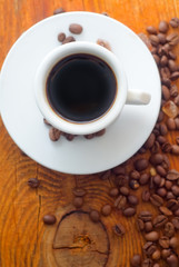 Fresh aroma coffee in the white cup, coffee and cinnamon