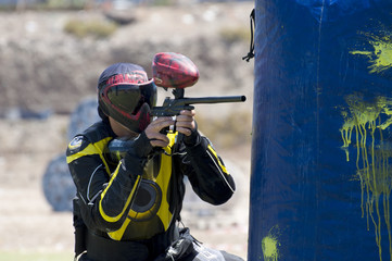 Paintball player in action