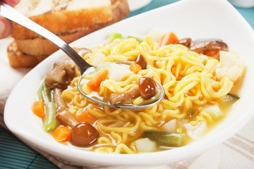 Noodle soup with mushrooms and vegetables
