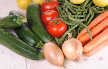 fresh organic vegetables on a wooden table