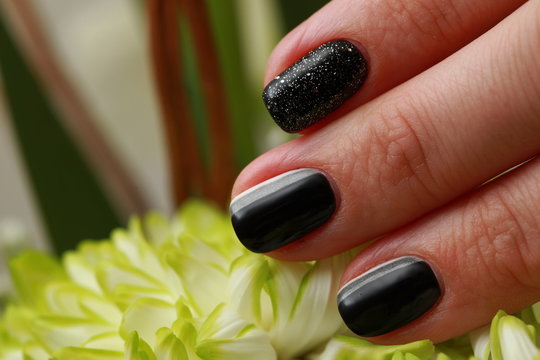 Black Nail Art On Floral Background