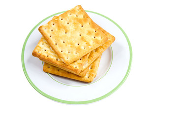 Pile Of Crackers On Plate.