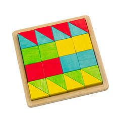 Colorful wooden toy blocks arranges in the tray for kids