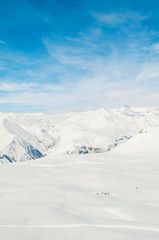 Snow mountains on bright winter day