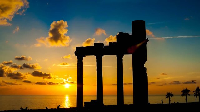 Sunset against the backdrop of ancient ruins