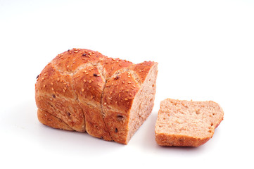Loaf of dark bread with sesame seeds