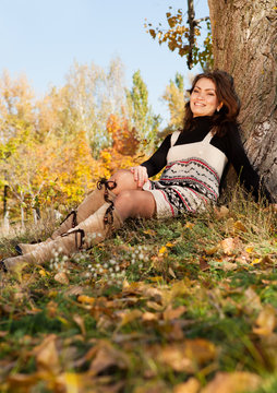 Happy young woman relax in park