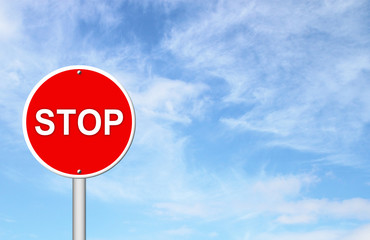 stop sign with blue sky