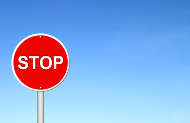 stop sign with blue sky