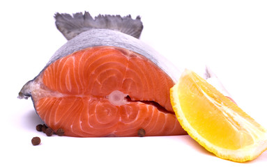 Salmon with lemon and pepper on a white background