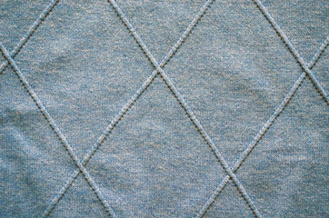 Fototapeta na wymiar Cross lines on knitted sweater pattern background