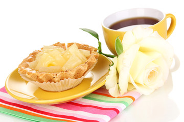 sweet cake with cup of tea isolated on white