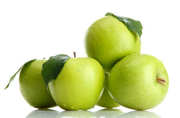 Ripe green apples with leaves  isolated on white