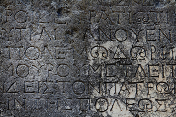A Greek inscription carved in stone at ancient ruins
