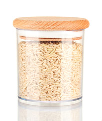 brown rice in jar on white background