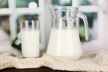Pitcher and glass of milk