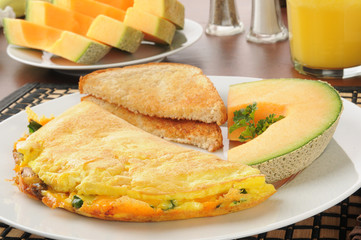 Western omelet with cantaloupe