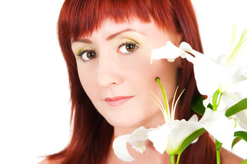 Fototapeta premium The girl with a lily flower