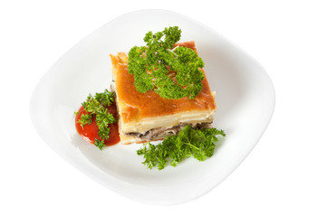 Casserole with mushrooms, meat and spices.