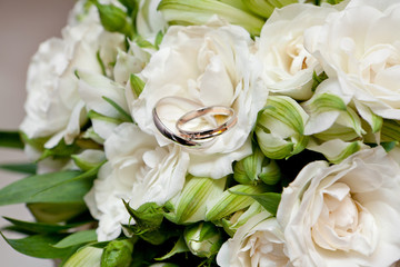 Gold wedding rings on flower . Decorating the wedding ceremony.