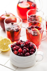 Cranberries with hot punch for winter and Christmas