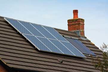 Central heating Solar Panels on a tiled roof