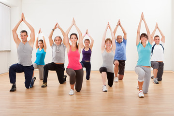 Group of people doing aerobics exercises