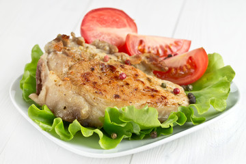 roasted pork fillet on a piece of lettuce