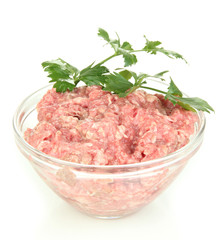 Bowl of raw ground meat isolated on white