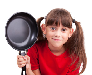 Little girl holding a frying pan