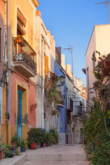 Fototapeta na wymiar Old street with multicolored houses