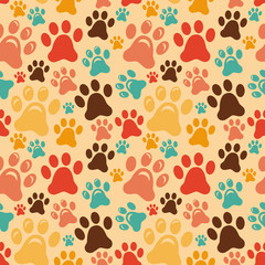 Fototapeta na wymiar Vector seamless pattern with animal paws