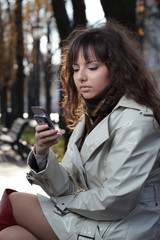 Beautiful young woman talking on the phone.