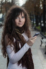 Beautiful young woman talking on the phone.