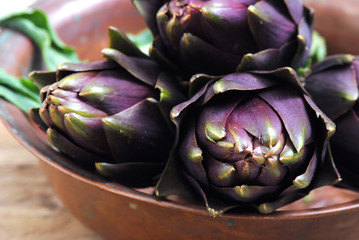 artichokes close on rustic background