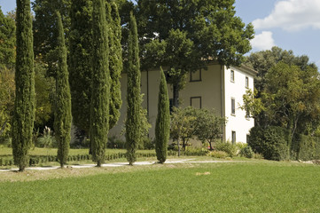 Italian house with cypresses