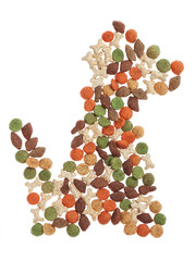 Funny dog shape from pieces of food. Close-up.