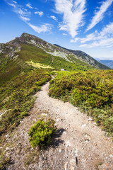 Mountain ridge and blue sky with clouds in Los Ancares, Leon, Sp