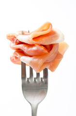 Prosciutto on a fork
