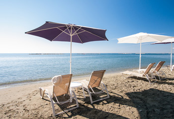 Beach chairs and umbrellas