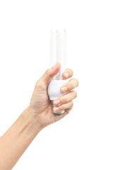 Hand holdind energy saving fluorescent lamp isolated on white ba