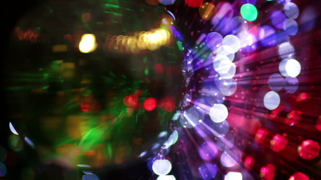 abstract funky discoball spinning with light effects and rays