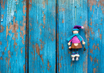 Doll on woody backgroud