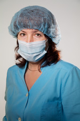 seriouse woman in medical mask