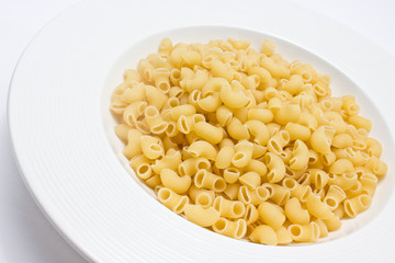 Macaroni on white plate.