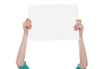 hands holding a blank white paper