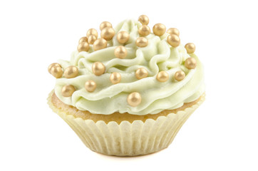 Cupcake mit Zitronen-Butter-Creme und goldenen Streuseln