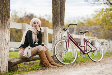 Fototapeta na wymiar Girl with bicycle