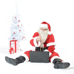 Weihnachtsmann mit Laptop