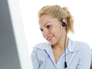 Charming girl with headset having a call